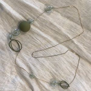 COS brand glass ball necklace on chain.